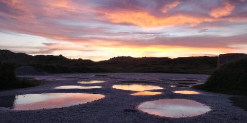 Zonsondergang na de regen